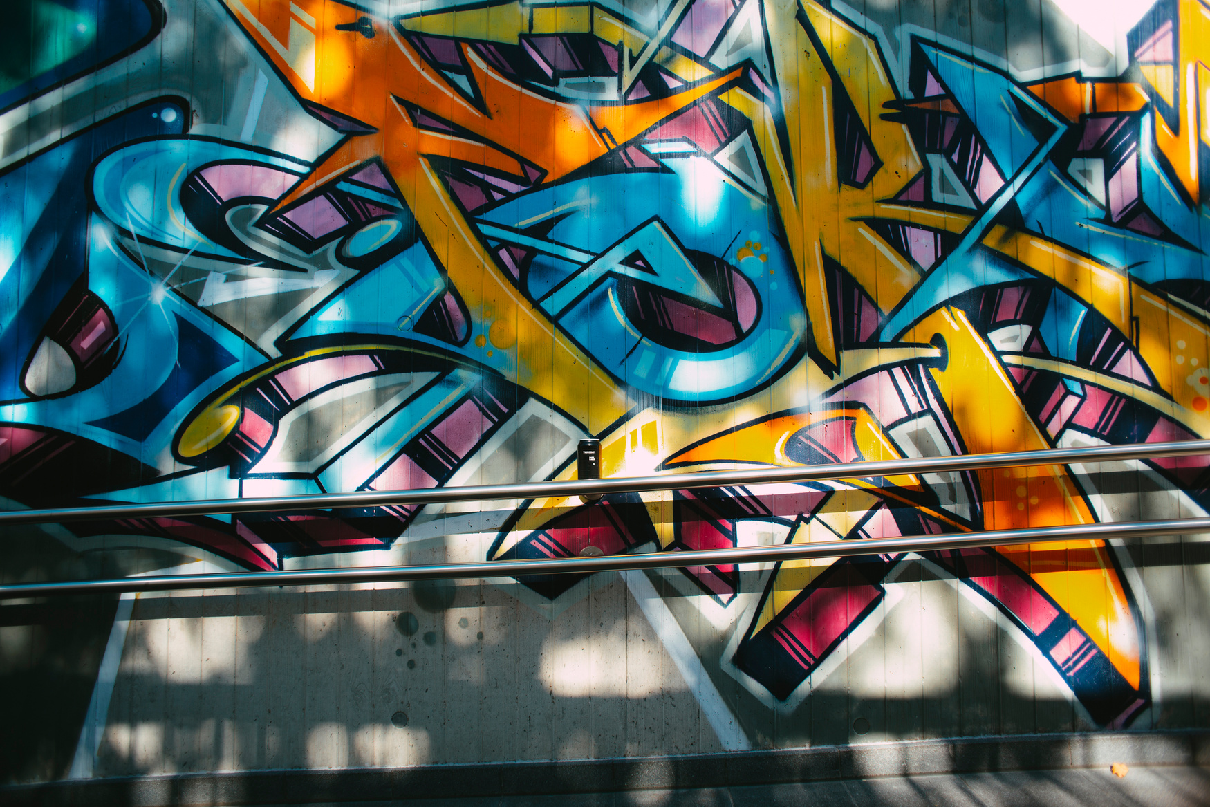 A Wall Covered in Graffiti